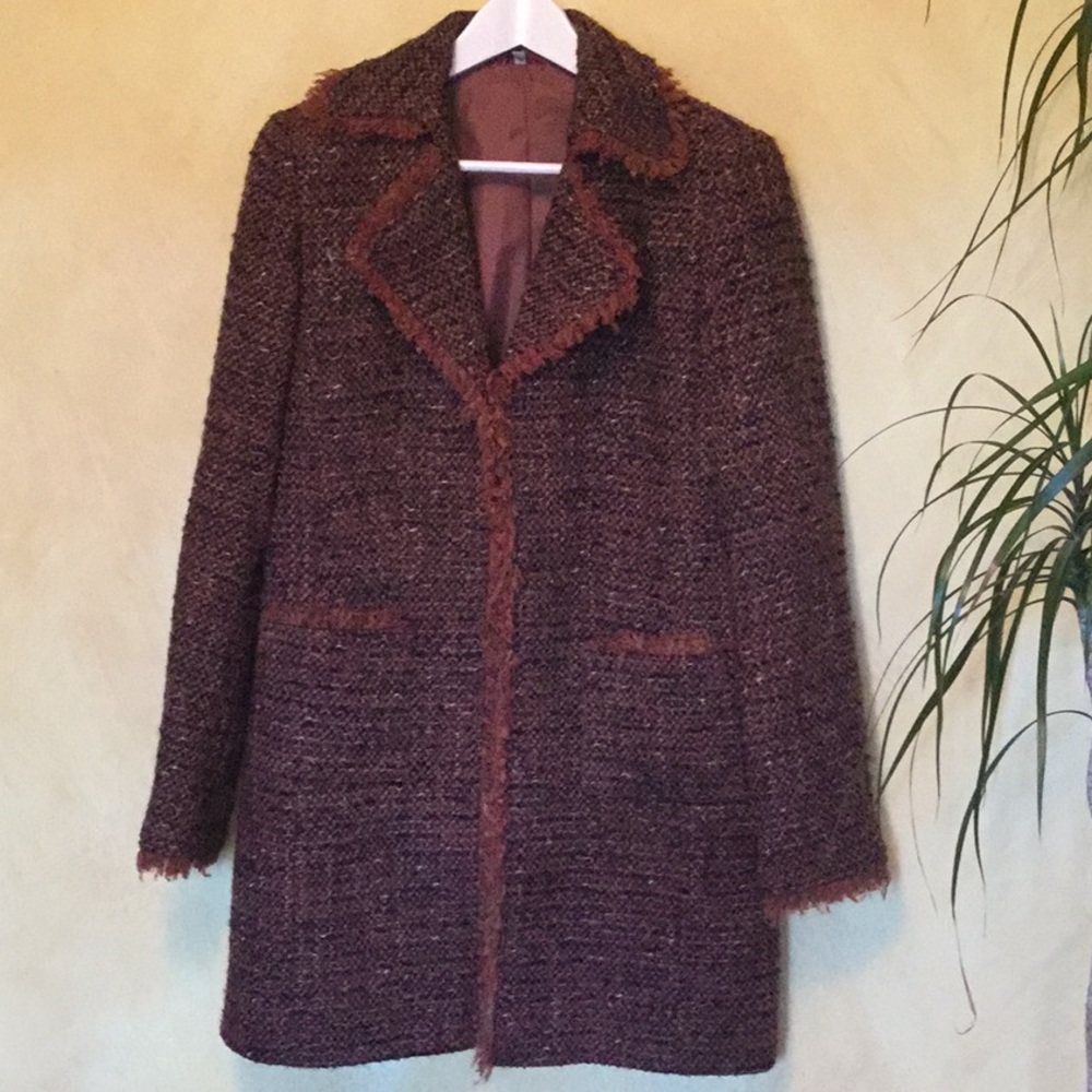 Coat with fringed edges